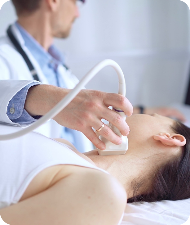 Physician performing neck ultrasound using handheld device, showcasing mobile diagnostic imaging benefits for outpatient clinics and family practices.